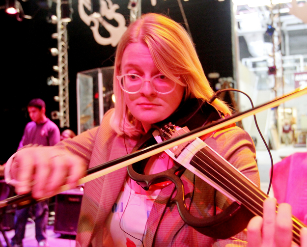 William D. Lewis The Vindicator Boardman HS 12th grade violinist Lizzie George during rehersal for Project Mayhem concert.