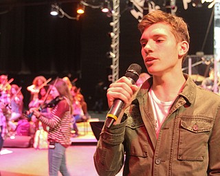 William D. Lewis The Vindicator Boardman HS 12th gradevocalist Nathaniel Ams during rehersal for Project Mayhem concert.