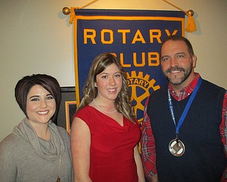 SPECIAL TO THE VINDICATOR
Lauren Good, a member of the Austintown Fitch High School speech team, recently presented her speech “Civility” to Austintown Rotary Club as part of the club’s Four-Way Speech Contest. The winner will compete in the district competition in Akron on April 1. Good is the daughter of Jeff and Kate Good. She plans to pursue a degree in international business at Miami University in the fall. Above, from left, are Andrea Reed, Fitch speech coach; Lauren Good; and Ed Kalaher, Rotary president. Below, at left, is Laura Ferreri, who was presented with a check from Kalaher to sponsor a team for this summer’s Austintown Community Baseball program.