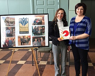 SPECIAL TO THE VINDICATOR
Maraline Kubik of Sister Jerome’s Mission was the guest speaker at Struthers Rotary Club meeting Feb. 21. Kubik was hosted by JoAnn Sweeney, Rotary president, and Jennifer Johnson. Kubick previously worked as a reporter at The Vindicator and The Business Journal. She has worked as the director of Sister Jerome’s Mission since January 2016. The mission provides assistance to low-income families and college students. The college program supports students at YSU, Eastern Gateway Community College, Kent State and Kent State-Trumbull. Students are paired with mentors who assist in identifying potential funding sources for the program, which includes gift cards and vouchers for food and school supplies. There are 10 students in the program, and they are required to maintain a part-time job while attending school. For information call 330-259-8765, email sisterjeromesmission@gmail.com, or visit www.theursulinecenter.org. Johnson, right, presented Kubik with a book that will be donated to the Struthers Elementary School library in her name.
