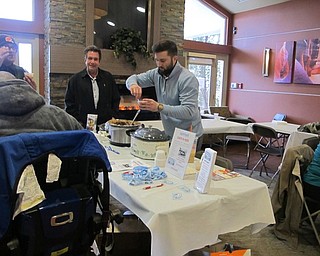 Neighbors | Alexis Bartolomucci.Representatives from the Comfort Care-a-Van served chili to guests on Feb. 28 at the first annual Greenbriar Chili Cook-Off.