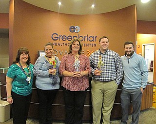 Neighbors | Alexis Bartolomucci.The first, second and third place winners in the first annual Chili Cook-Off at Greenbriar held their winning prizes on Feb. 28.