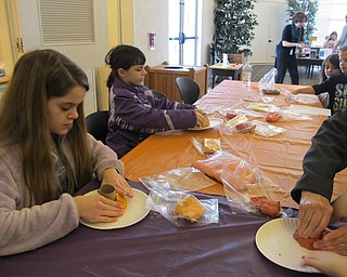 Neighbors | Alexis Bartolomucci.Children made volcanos out of clay during the I Survived program at the Austintown library.