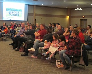 Neighbors | Alexis Bartolomucci.Austintown community members came to the Immaculate Heart Parish Center to meet and talk with Jim Tressel on March 8.