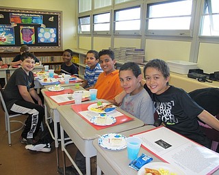 Neighbors | Alexis Bartolomucci.Fourth-grade students ate a celebratory American Revolution snack after finishing their reading workshop at Robinwood Lane Elementary.