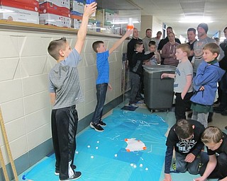 Neighbors | Alexis Bartolomucci.Students prepared to drop their eggs for the egg drop contest on March 9 at the father-son mad scientist event at Dobbins Elementary.