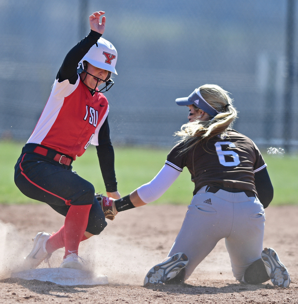 YOUNGSTOWN, OHIO - MARCH 23, 2017: Alexis Roach #8 of YSU  slides into second base beating the tag of short stop Emma Borysevicz #6 of St. Bonaventure in the third inning of game one, Thursday afternoons game at Youngstown State. DAVID DERMER | THE VINDICATOR
