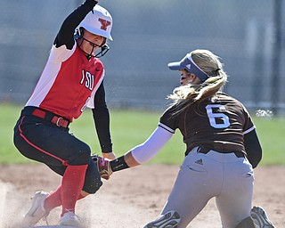 YOUNGSTOWN, OHIO - MARCH 23, 2017: Alexis Roach #8 of YSU  slides into second base beating the tag of short stop Emma Borysevicz #6 of St. Bonaventure in the third inning of game one, Thursday afternoons game at Youngstown State. DAVID DERMER | THE VINDICATOR
