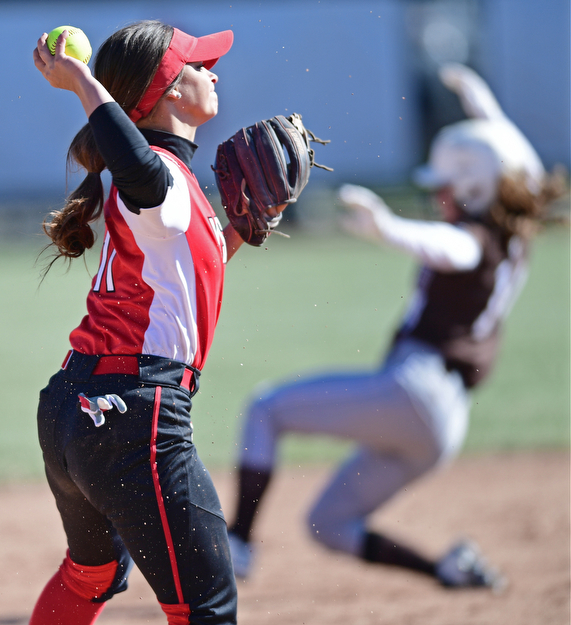YOUNGSTOWN, OHIO - MARCH 23, 2017: Short stop Demi Ann Patonis #11 of YSU throws to first for the out in the 5th inning of game one, Thursday afternoons game at Youngstown State. DAVID DERMER | THE VINDICATOR