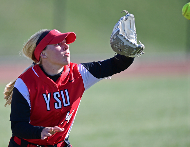 YOUNGSTOWN, OHIO - MARCH 23, 2017: Left fielder Sarah Dowd #14 of YSU gets under the fly ball for the out in the sixth inning of game one, Thursday afternoons game at Youngstown State. DAVID DERMER | THE VINDICATOR