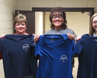 SPECIAL TO THE VINDICATOR
Greater Federation of Women’s Clubs, Ohio, Austintown Junior Women’s League met in March at Austintown Fitch High School. Fitch teachers, Adam Leskanic and Diane Devine, taught members how to screen print the league’s new logo on T-shirts, and how to use the sublimation process to put the logo on coffee mugs. Above, members participating from left, were Maribeth McGlynn, Eileen Frost, Ruty Rodriguez-Patterson and Lauren Wolfgang. Below are Linda Jones and Janie Surman. For information visit www.facebook.com/AJWL 2014.
