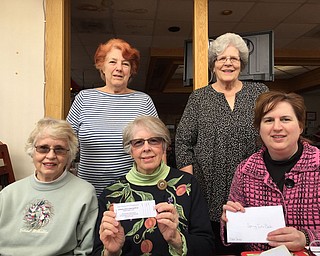 
League of Women Voters of Trumbull County is selling raffle tickets for its educational fund. The club will sell 100 tickets for a monetary prize of $250, with the drawing set for May 20. Tickets are $5, and winners do not have to be present. To buy tickets, call Jan, ticket chairman, at 330-766-0837. Members of the league will support the Women’s History Luncheon at Packard Museum in Warren. Members also are planning the annual “Women’s Equality Day” which will take place Aug. 26 at Women’s Park, Warren. In front, from left, are Kirsten Burkey, Sue Smith and Janice Hardman. In back are Peggy Boyd and Sandy Mahaffey. The league meets the fourth Monday of the month, and membership and meetings are open to the public. For information, go to www.orgsites.com/oh/lwvtc, or call 330-367-4886. SPECIAL TO THE VINDICATOR