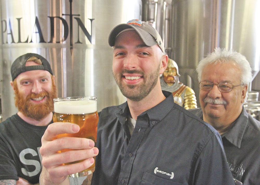 State Line Brewers Guild members from left to right, Ira Gerhart of Noble Creature Cask House, Josh Dunn of Birdfish Brewing and Bob Schott of Paladin Brewing at Paladin Brewing in Austintown 3-22-17.