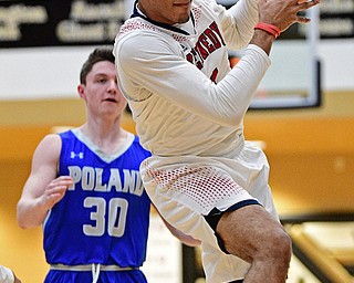 WARREN, OHIO - MARCH 28, 2017: Antonio McQueen #1 of JFK comes down with the ball after a deep pass after getting behind Kyle Patterson #30 of Poland during the first half of the Frank Bubba Boys All Star Game, Tuesday night at Warren Harding High School. DAVID DERMER | THE VINDICATOR