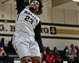 WARREN, OHIO - MARCH 28, 2017: Lynn Bowden #23 of Harding dunks the ball during the first half of the Frank Bubba Boys All Star Game, Tuesday night at Warren Harding High School. DAVID DERMER | THE VINDICATOR