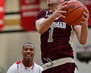 WARREN, OHIO - MARCH 28, 2017: John Ryan #1 of Boardman goes to the basket after getting around Tariq Drake #14 of Labrae during the first half of the Frank Bubba Boys All Star Game, Tuesday night at Warren Harding High School. DAVID DERMER | THE VINDICATOR