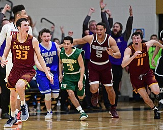 WARREN, OHIO - MARCH 28, 2017: Anthony Ritter #33 of South Range celebrates after nailing a game winning three at the buzzer while teammates Dan Ritter #11, Travis Koontz #5, Anise Algahemy #3 and Kyle Patterson #30 celebrate behind him during the second half of the Frank Bubba Boys All Star Game, Tuesday night at Warren Harding High School. DAVID DERMER | THE VINDICATOR