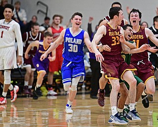 WARREN, OHIO - MARCH 28, 2017: Anthony Ritter #33 of South Range celebrates after nailing a game winning three at the buzzer while teammates Dan Ritter #11, Travis Koontz #5, Anise Algahemy #3 and Kyle Patterson #30 celebrate behind him during the second half of the Frank Bubba Boys All Star Game, Tuesday night at Warren Harding High School. DAVID DERMER | THE VINDICATOR