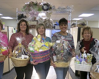 SPECIAL TO THE VINDICATOR
During a recent meeting, Austintown Junior Women’s League members prepared baskets for their 10th annual A Taste of Austintown scholarship fundraiser. It will take place at Immaculate Heart of Mary Parish Center, 4500 Norquest Blvd., Austintown, at 6 p.m. Saturday. There will be food available for purchase from local vendors, basket and 50-50 raffles, and dancing. Awards will be given for best taste and presentation. For information, visit the AJWL 2014 page on Facebook. Members, from left, are Marcia Denamen, Janette Neal, Linda Jones, Ruty Rodriguez-Patterson, Sue Hovanec and Lynn Larson.