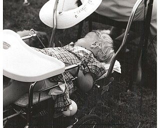 Nap time at the 1954 Canfield Fair.
