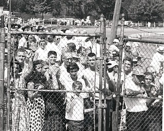 Visitors line up for to hear the nationally famous Lennon Sisters and to watch the water show feature in 1957.