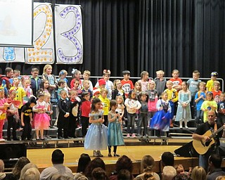 Neighbors | Alexis Bartolomucci.Two kindergarten students had a special solo during one of the songs during the concert on March 8 at Poland Seminary High School.
