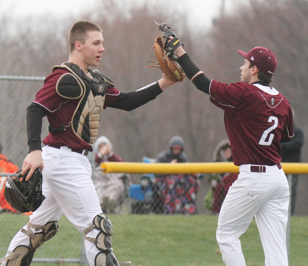 William D Lewis The Vindicator  Boardman catcher Coleman Stauffer(55) and pitcher Nick Augustine (2) react after defeating Fitch 3-0 at Boardman 3-30-17.