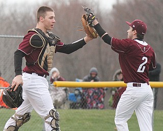 William D Lewis The Vindicator  Boardman catcher Coleman Stauffer(55) and pitcher Nick Augustine (2) react after defeating Fitch 3-0 at Boardman 3-30-17.