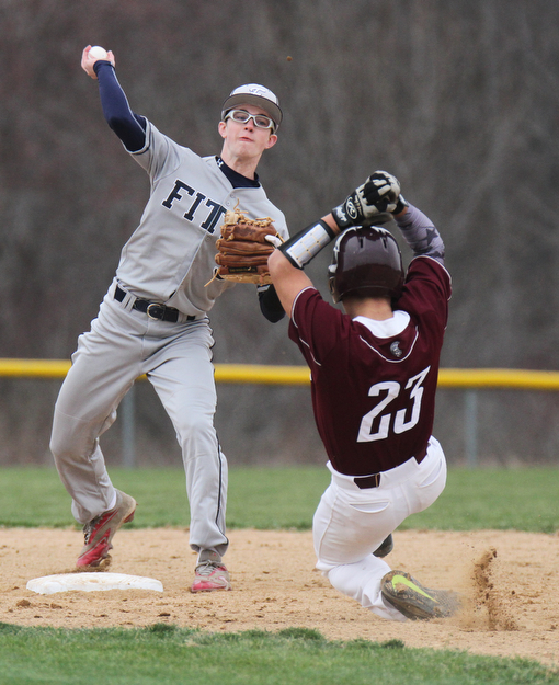 William D Lewis The Vindicator  Boardman's Alex Cardona(23) is out at 2nd as Fitch's Vinny Direnzo(3) tries to turn a double play during 3-30 game at Boardman.