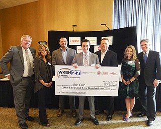 SPECIAL TO THE VINDICATOR: 
WKBN-TV 27’s Caring for Our Community Campaign representatives and sponsors presented the $1,500 Tom Holden Memorial Scholarship to Alec Cole of Trumbull Career & Technical Center on March 24. From left, are William Shivers, Huntington Bank; Linda Eynon, Safelite AutoGlass; Ryan Sheridan, Braking Point Recovery Center; Cole; and Dave Sess, Mandy Noell and Stan Boney of WKBN-TV 27.