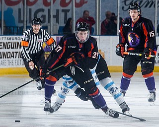 Scott R. Galvin | The Vindicator.Youngstown Phantoms forward Max Ellis (37) skates the puck up ice during the first period against the  Lincoln Stars  at the Covelli Centre on April 1, 2017...