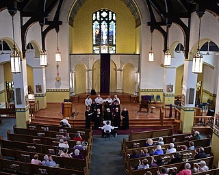 YOUNGSTOWN, OHIO - APRIL 2, 2017: Members of the Mahoning Valley Chorale Lenten Concert perform in front of the crowd at St. Angela Merici Parish, Sunday afternoon. DAVID DERMER | THE VINDICATOR