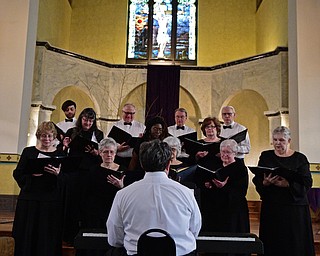 YOUNGSTOWN, OHIO - APRIL 2, 2017: Members of the Mahoning Valley Chorale Lenten Concert perform in front of the crowd at St. Angela Merici Parish, Sunday afternoon. DAVID DERMER | THE VINDICATOR