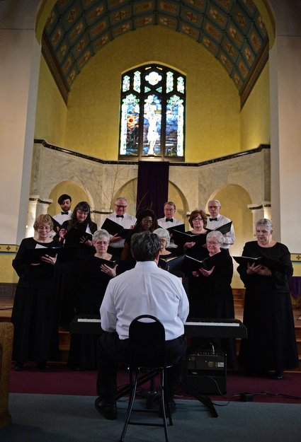 YOUNGSTOWN, OHIO - APRIL 2, 2017: Members of the Mahoning Valley Chorale Lenten Concert perform in front of the crowd at St. Angela Merici Parish, Sunday afternoon. DAVID DERMER | THE VINDICATOR