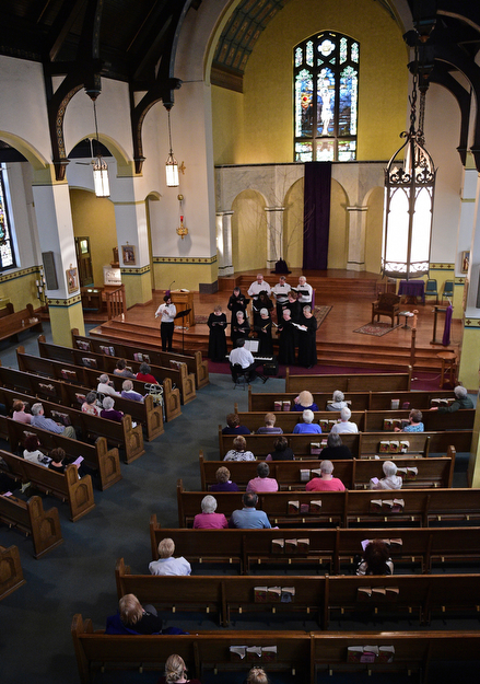 YOUNGSTOWN, OHIO - APRIL 2, 2017: Members of the Mahoning Valley Chorale Lenten Concert perform in front of the crowd at St. Angela Merici Parish, Sunday afternoon. DAVID DERMER | THE VINDICATOR
