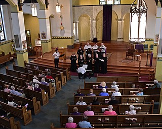 YOUNGSTOWN, OHIO - APRIL 2, 2017: Members of the Mahoning Valley Chorale Lenten Concert perform in front of the crowd at St. Angela Merici Parish, Sunday afternoon. DAVID DERMER | THE VINDICATOR