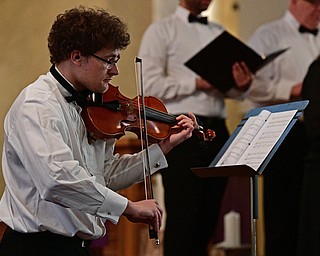YOUNGSTOWN, OHIO - APRIL 2, 2017: David Timlin of Boardman plays the violin during a performance of ' Within the Shadow of the Cross", at St. Angela Merici Parish, Sunday afternoon. DAVID DERMER | THE VINDICATOR