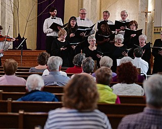 YOUNGSTOWN, OHIO - APRIL 2, 2017: Members of the Mahoning Valley Chorale Lenten Concert perform in front of the crowd at St. Angela Merici Parish, Sunday afternoon. DAVID DERMER | THE VINDICATOR