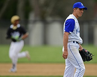 POLAND, OHIO - APRIL 3, 2017: Starting pitcher Dan Drummond #2 of Poland shows his frustration after allowing a solo home run to Grant Williams #1 of Harding in the second inning of Monday nights game at Poland High School. DAVID DERMER | THE VINDICATOR
