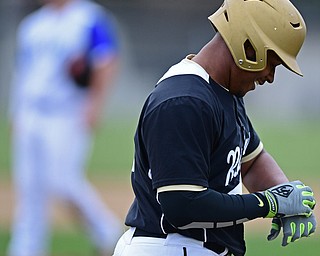 POLAND, OHIO - APRIL 3, 2017: Grant Williams #1 of Harding smiles after hitting a solo home run off starting pitcher Dan Drummond #2 of Poland in the second inning of Monday nights game at Poland High School. DAVID DERMER | THE VINDICATOR