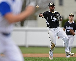 POLAND, OHIO - APRIL 3, 2017: Third basemen Grant Williams #1 of Harding throws to first to force out Cole Kosco #6 of Poland in the fourth inning of Monday nights game at Poland High School. DAVID DERMER | THE VINDICATOR