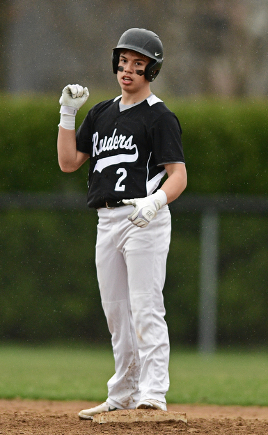 POLAND, OHIO - APRIL 3, 2017: Antonio Walker #2 of Harding pumps his fist after a RBI hit in the fifth inning of Monday nights game at Poland High School. DAVID DERMER | THE VINDICATOR