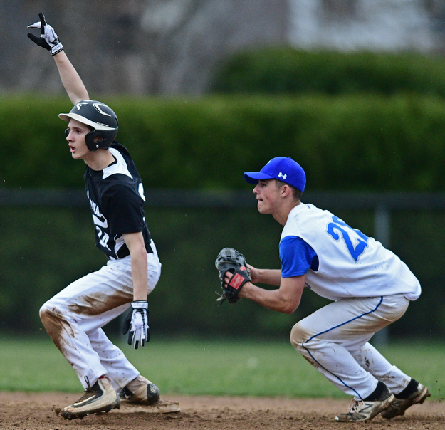 POLAND, OHIO - APRIL 3, 2017: Nick Fitzgerald #24 of Harding celebrates after hitting a two RBI double in the fifth inning of Monday nights game at Poland High School. DAVID DERMER | THE VINDICATOR