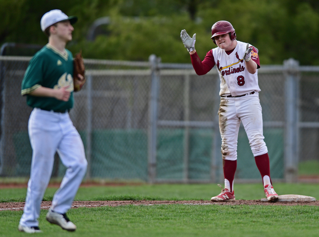 STRUTHERS, OHIO - APRIL 4, 2017: Bryce Richey #8 of Mooney celebrates after hitting a lead off triple off starting pitcher Carmen Cavalier #8 of Ursuline in the third inning of Tuesday nights game at Cene Park. Mooney won 10-6. DAVID DERMER | THE VINDICATOR