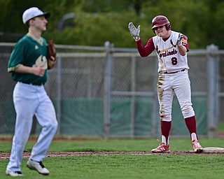 STRUTHERS, OHIO - APRIL 4, 2017: Bryce Richey #8 of Mooney celebrates after hitting a lead off triple off starting pitcher Carmen Cavalier #8 of Ursuline in the third inning of Tuesday nights game at Cene Park. Mooney won 10-6. DAVID DERMER | THE VINDICATOR