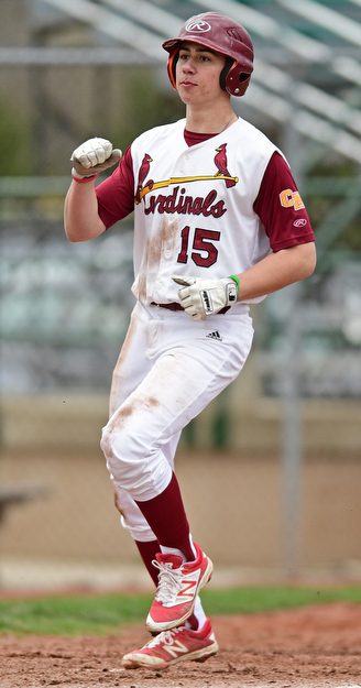 STRUTHERS, OHIO - APRIL 4, 2017: Ryan Stafanec #15 of Mooney pumps his fist after scoring the go ahead run in the sixth inning of Tuesday nights game at Cene Park. Mooney won 10-6. DAVID DERMER | THE VINDICATOR