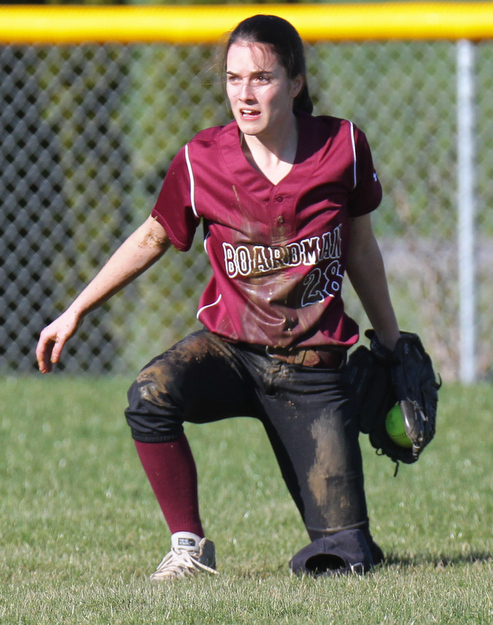 William D. Lewis the vindicator Boardman's Vanessa Roush (28) comes up covered in mud after making a diving catch during a 4-5-17 game with Howland at Boardman.