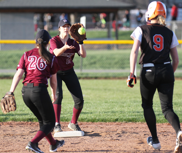 William D. Lewis the vindicator Howland's Sara Price(9) is out at 2nd as Boardman's Lauren Pavlansky(26) tosses the ball to Alicia Saxton(10) to make the play during a 4-5-17 game at Boardman.