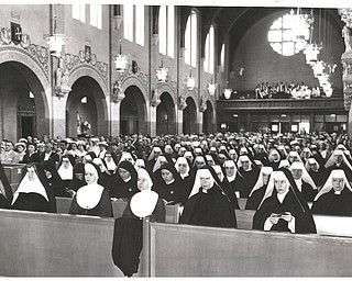 More than 100 sisters representing several religious orders form a part of the crowd at the dedication of St. Dominic’s Church.