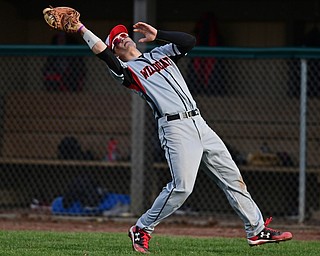 STRUTHERS, OHIO - MARCH 27, 2017: First basemen John Medvec #9 of Struthers catches a bad in foul ground for the out in the fourth inning of Monday nights game at Cene Park. DAVID DERMER | THE VINDICATOR